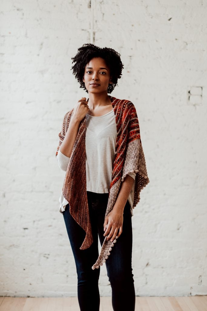 Try the Bronwyn Shawl, a FREE crochet triangle shawl pattern from TLYCBlog.com. Explore the range of crochet techniques and stitches in this asymmetrical triangle wrap. Elevate the experience by using luxurious yarns like merino wool and baby alpaca. Find the FREE crochet pattern on TLYCBlog.com with links to helpful tutorial videos. | TLYCBlog.com
